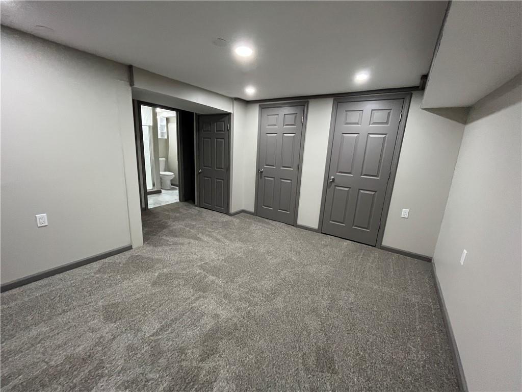 500 Scene Ridge Road McKeesport, PA 15133 - Photo 22 of 26 an empty room with closet and mirror