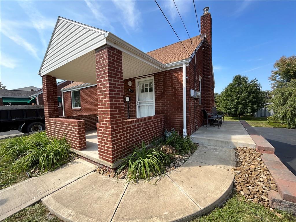 500 Scene Ridge Road McKeesport, PA 15133 - Photo 23 of 26 a view of house with outdoor seating