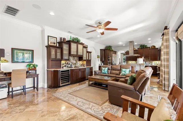 a kitchen with stainless steel appliances granite countertop a sink and cabinets