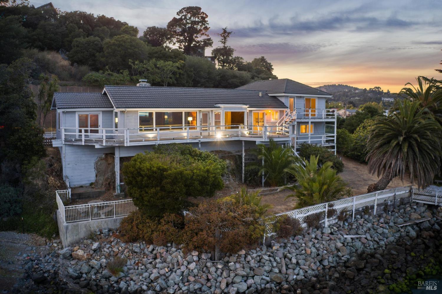 836 Point San Pedro Road San Rafael, CA 94901 - Photo 17 of 83 a front view of a house with a yard
