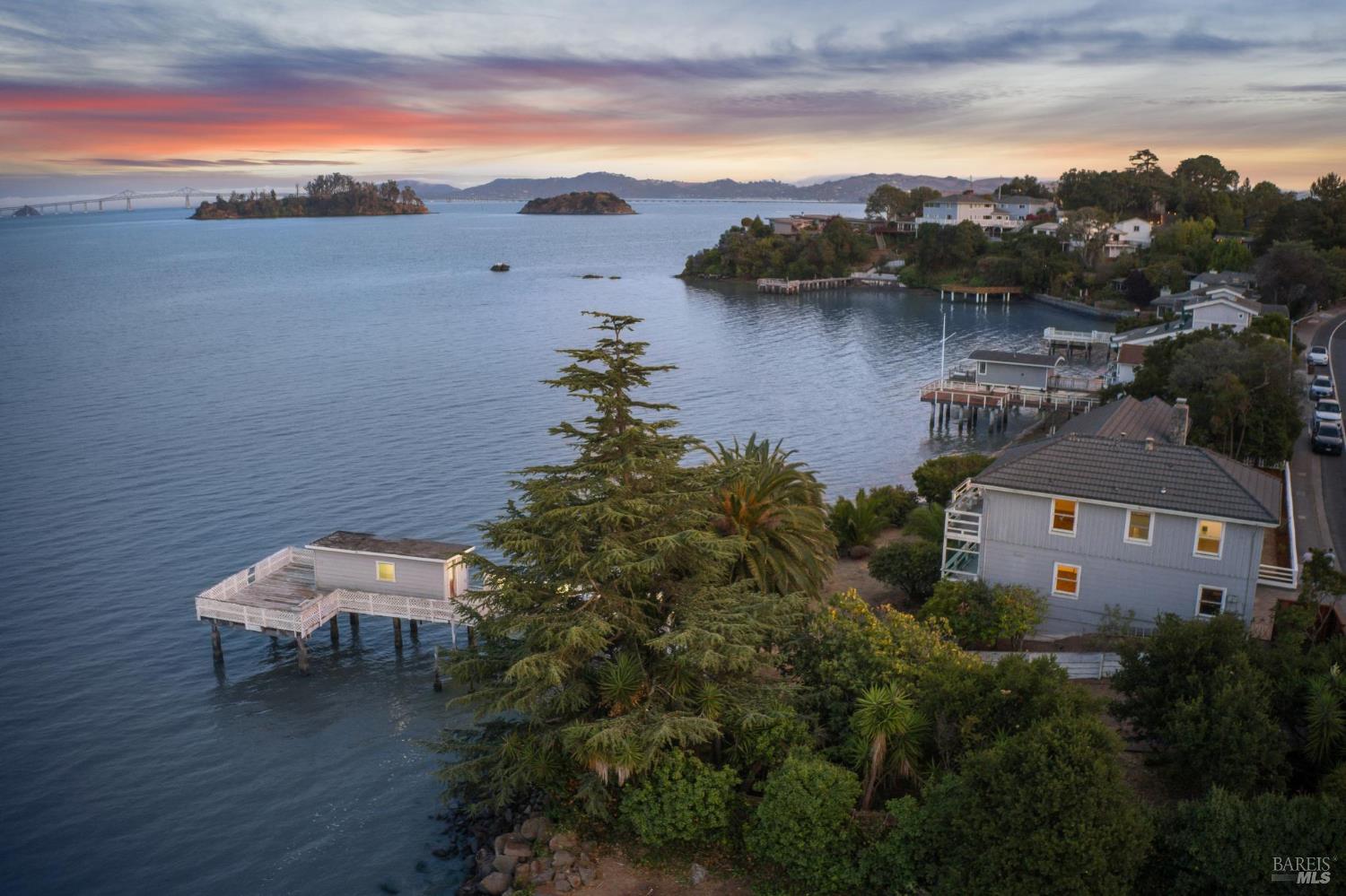 836 Point San Pedro Road San Rafael, CA 94901 - Photo 23 of 83 a view of a lake with a mountain in the background