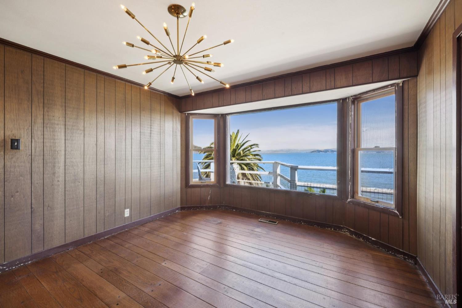 836 Point San Pedro Road San Rafael, CA 94901 - Photo 36 of 83 wooden floor in an empty room with a window