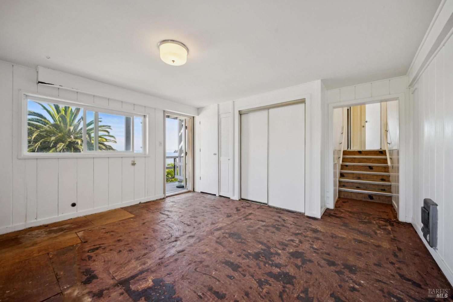 836 Point San Pedro Road San Rafael, CA 94901 - Photo 55 of 83 a view of an empty room with a window