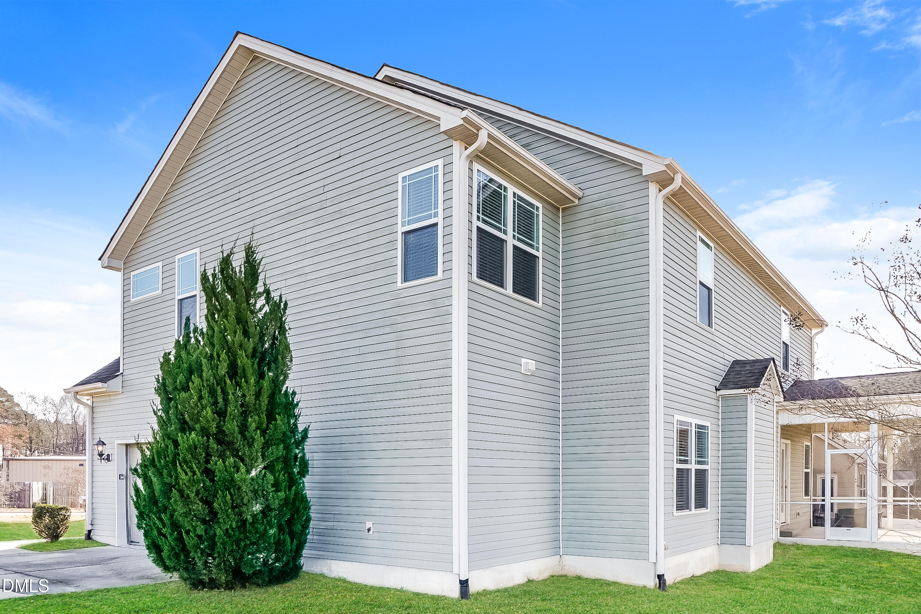19 Labradoodle Court Garner, NC 27529 - Photo 15 of 17 a front view of a house with a yard