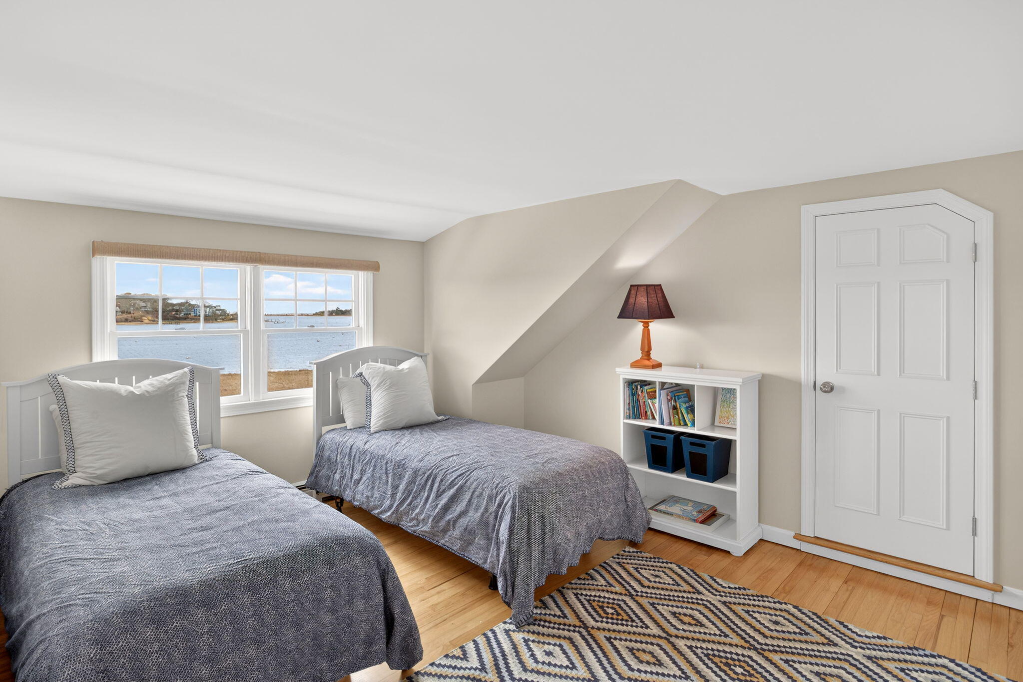 346 Morris Island Road Chatham, MA 02633 - Photo 28 of 33 a bedroom with two beds and a window