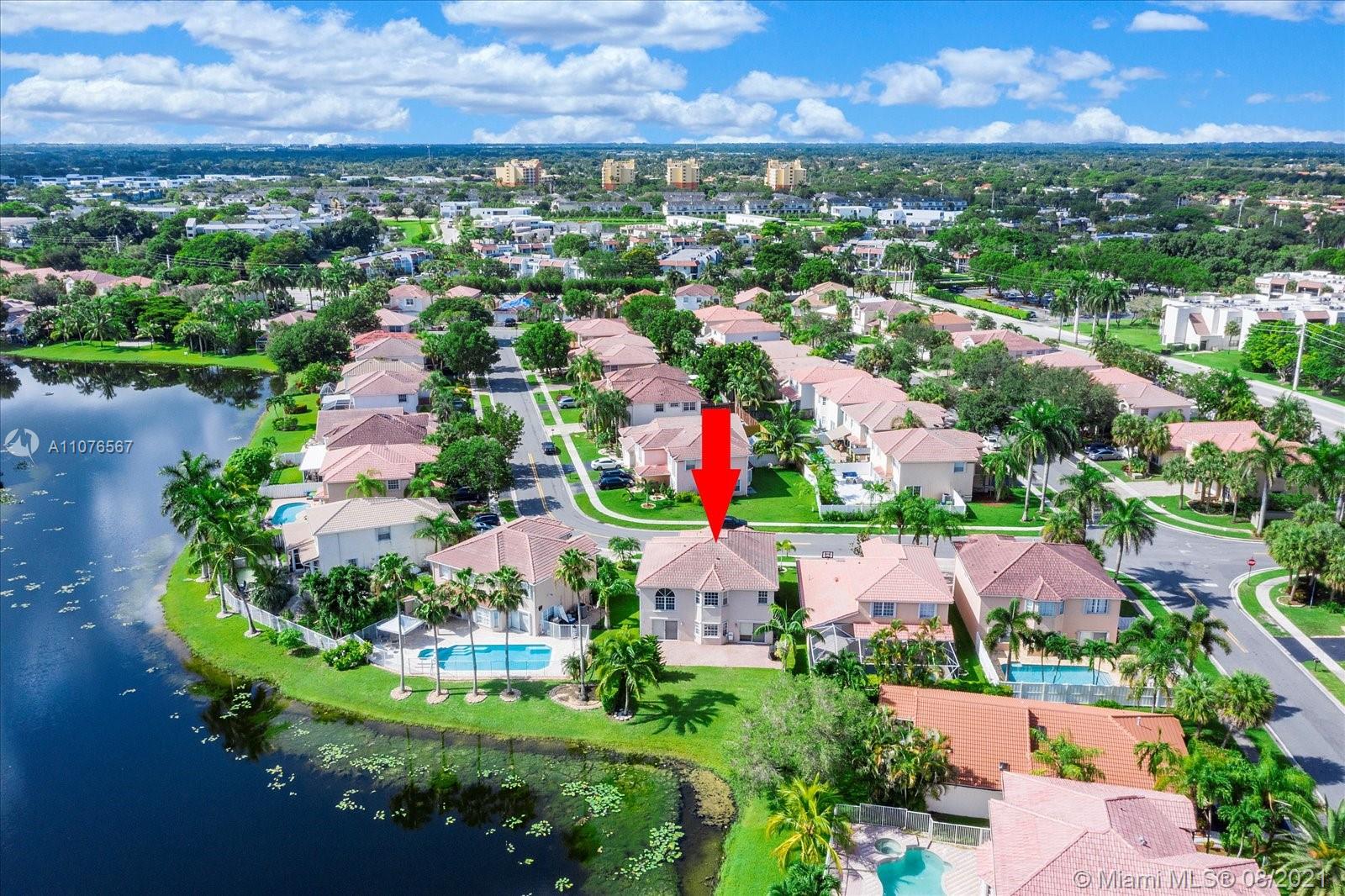 153 Granada Avenue Weston, FL 33326 - Photo 36 of 37 an aerial view of residential houses with outdoor space and street view