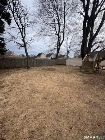 a view of yard with large tree