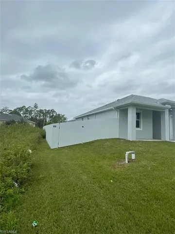 a house view with a outdoor space