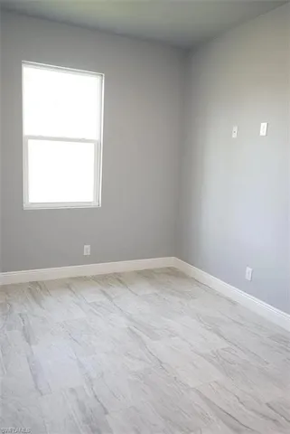 an empty room with a window