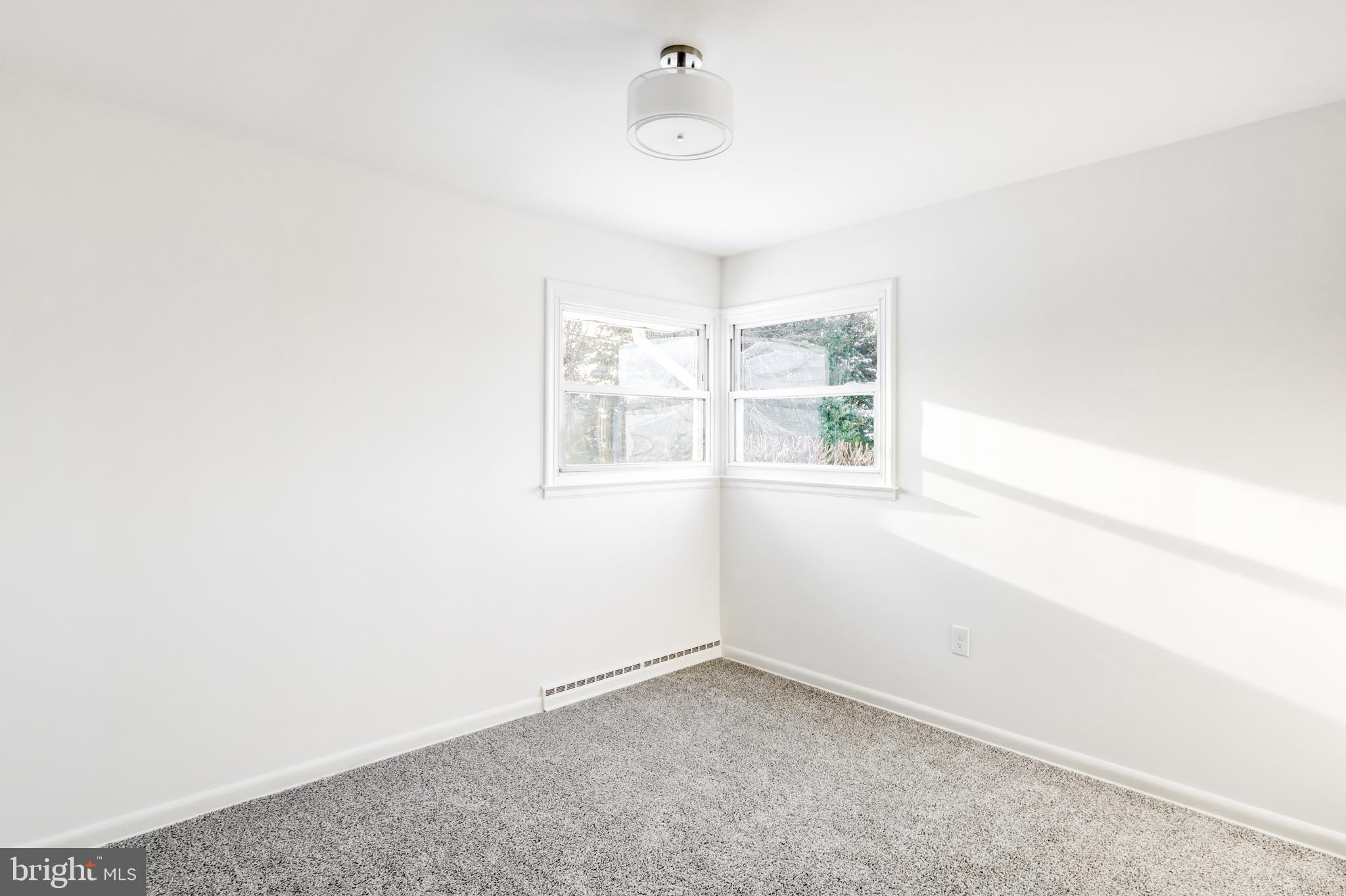 163 Thomas Place Reading, PA 19608 - Photo 17 of 36 an empty room with windows