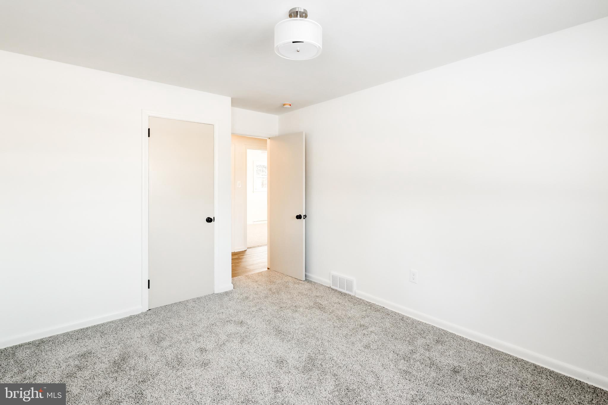 163 Thomas Place Reading, PA 19608 - Photo 22 of 36 a view of a room with an empty space