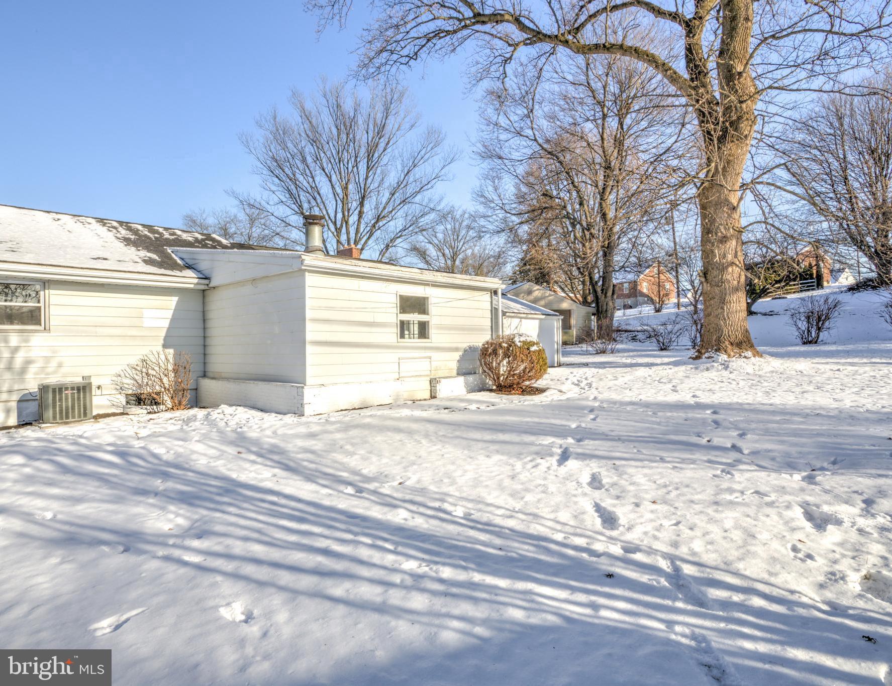 163 Thomas Place Reading, PA 19608 - Photo 36 of 36 a view of a house with a yard