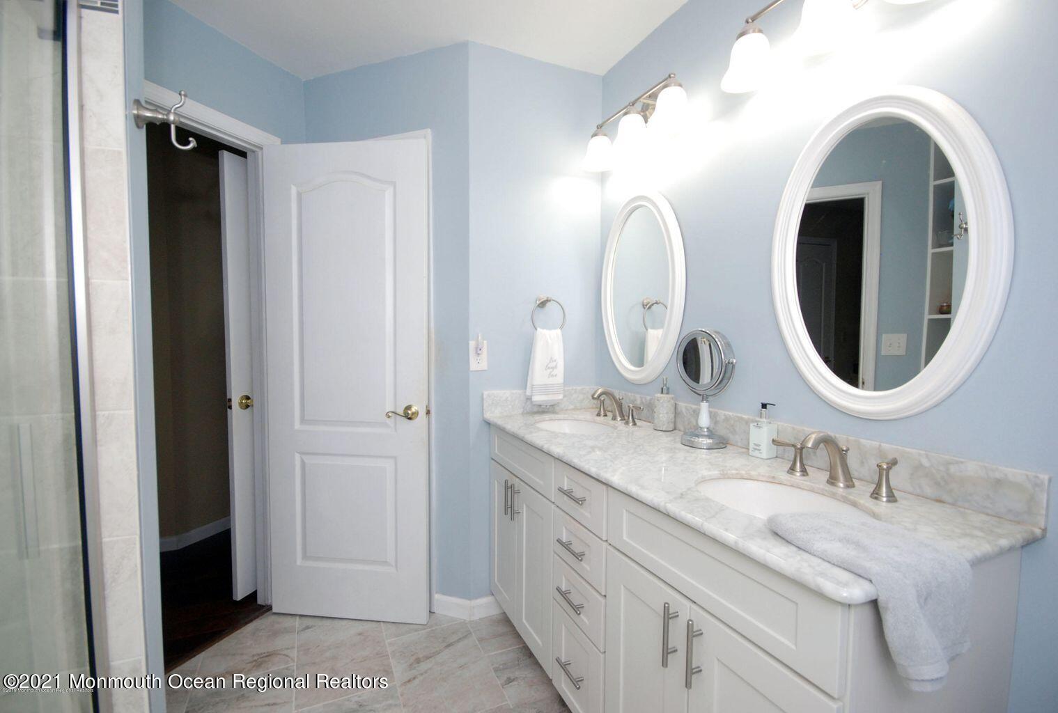 32 Waverly Lane Jackson, NJ 08527 - Photo 12 of 19 a bathroom with a granite countertop double vanity sink and a mirror