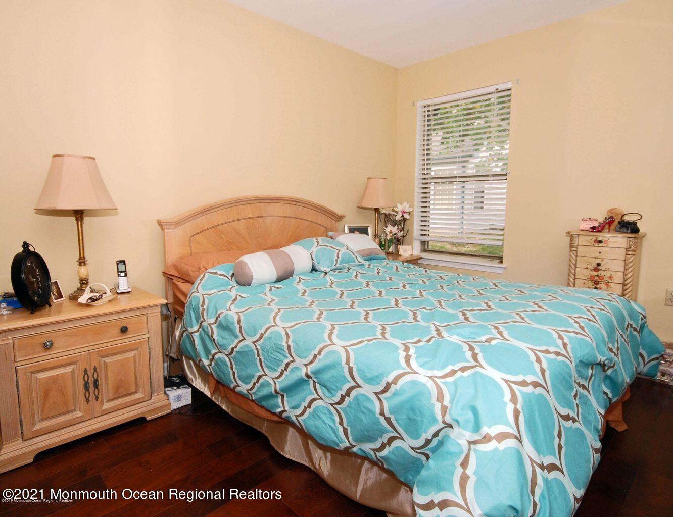 32 Waverly Lane Jackson, NJ 08527 - Photo 14 of 19 a bedroom with a bed and a window