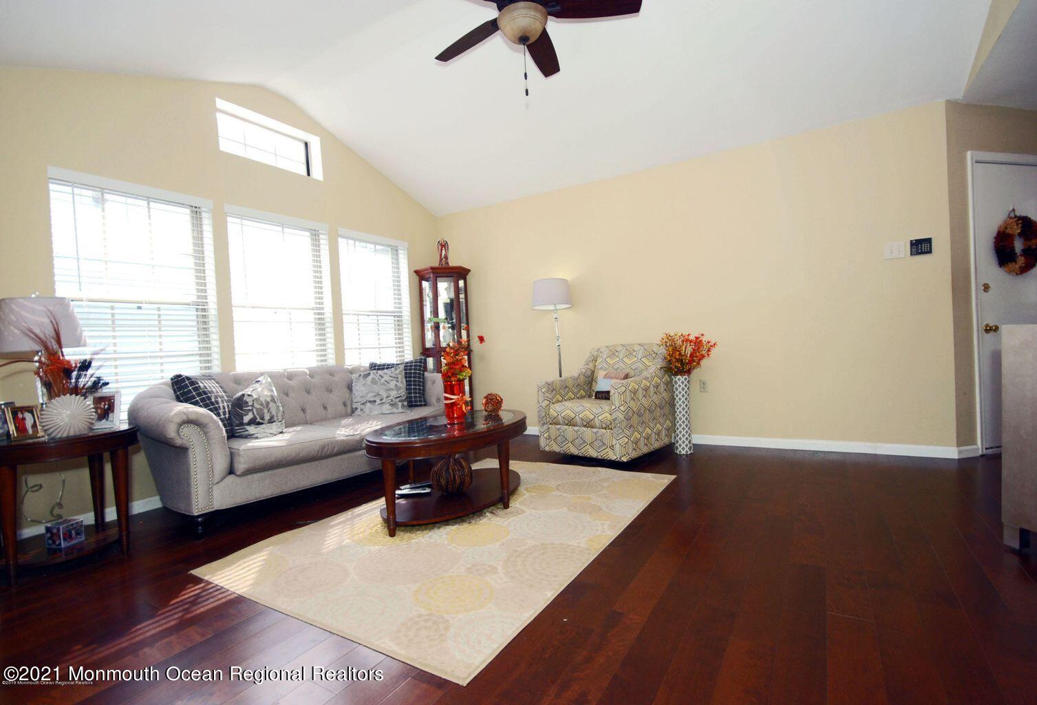 32 Waverly Lane Jackson, NJ 08527 - Photo 4 of 19 a living room with furniture and a large window