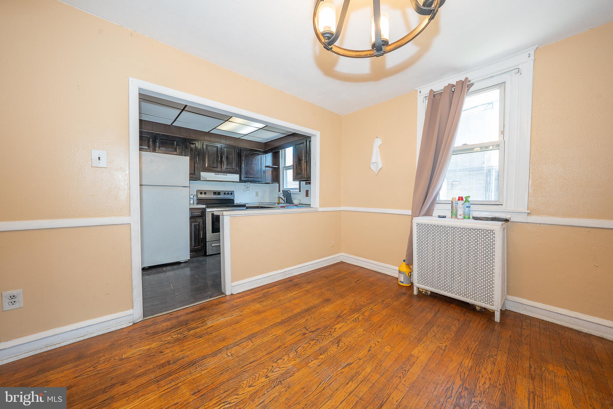 361 Richfield Road Upper Darby, PA 19082 - Photo 11 of 35 a view of a kitchen with wooden floor and a kitchen