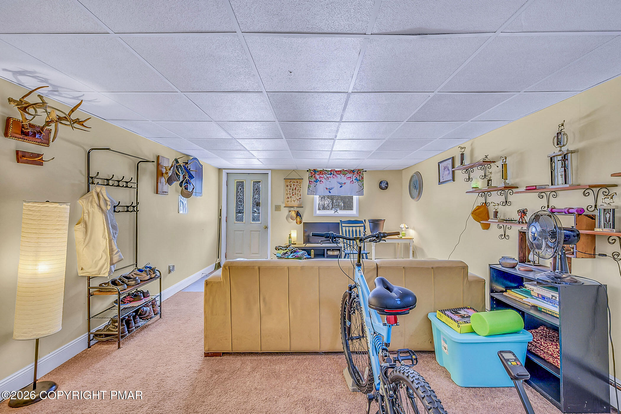 12 Coal Street Nesquehoning, PA 18240 - Photo 18 of 37 a living room with lots of furniture and a chandelier