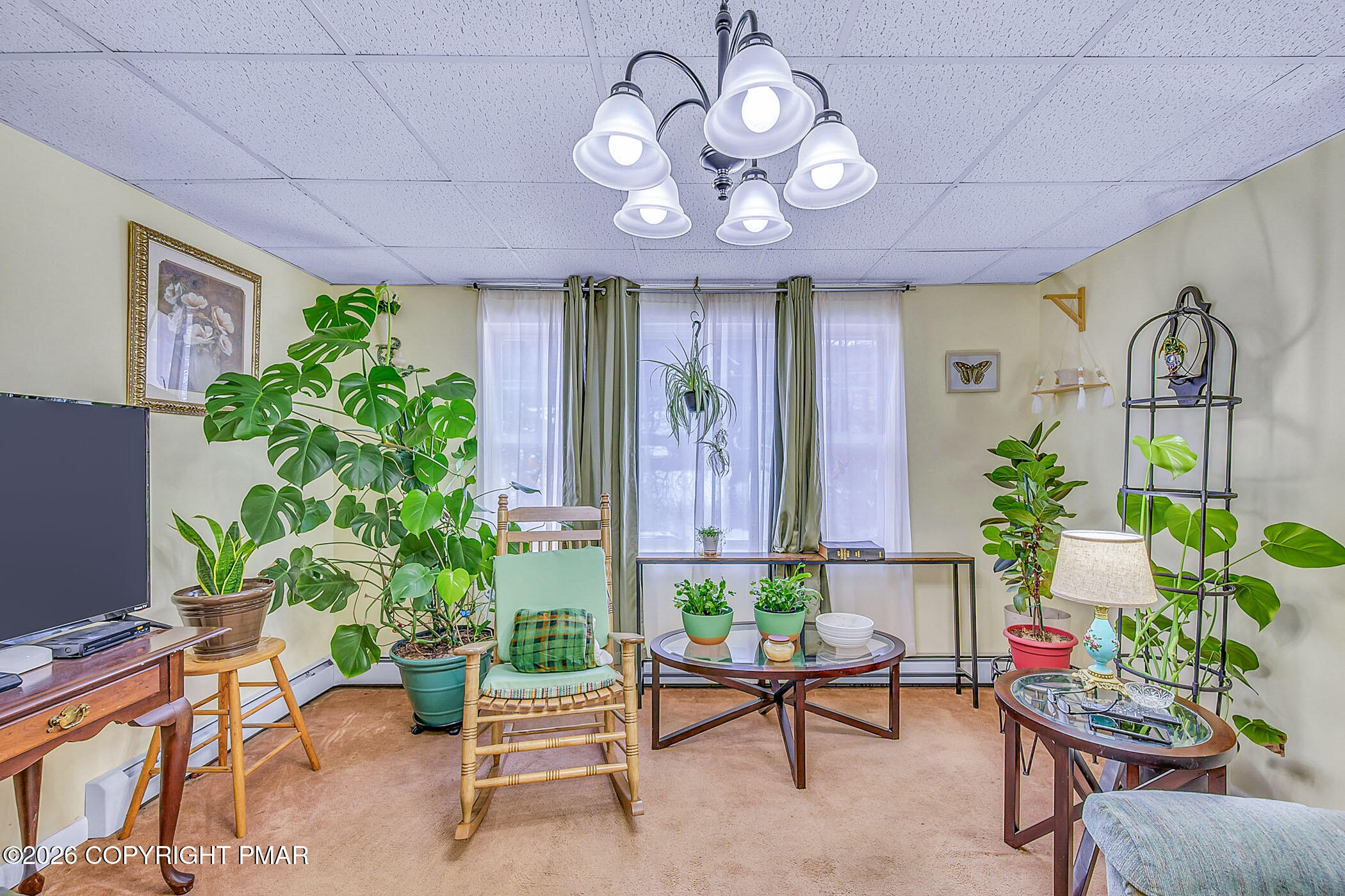 12 Coal Street Nesquehoning, PA 18240 - Photo 2 of 37 a living room filled with furniture chandelier and a window