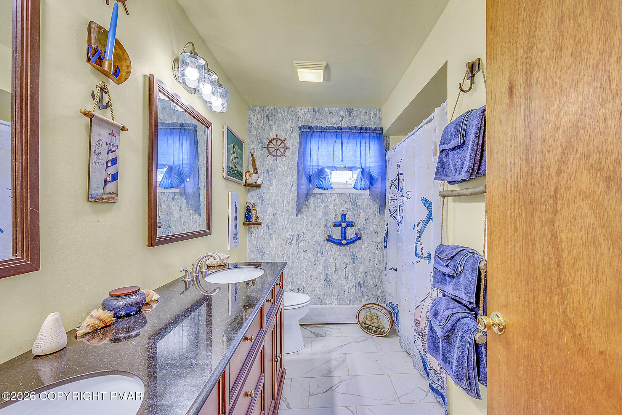 12 Coal Street Nesquehoning, PA 18240 - Photo 26 of 37 a kitchen with stainless steel appliances lots of clutter and cabinets