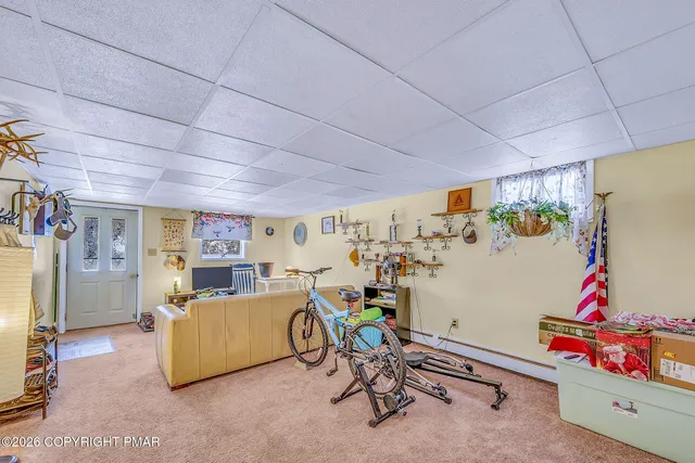 a bed room with furniture and a window