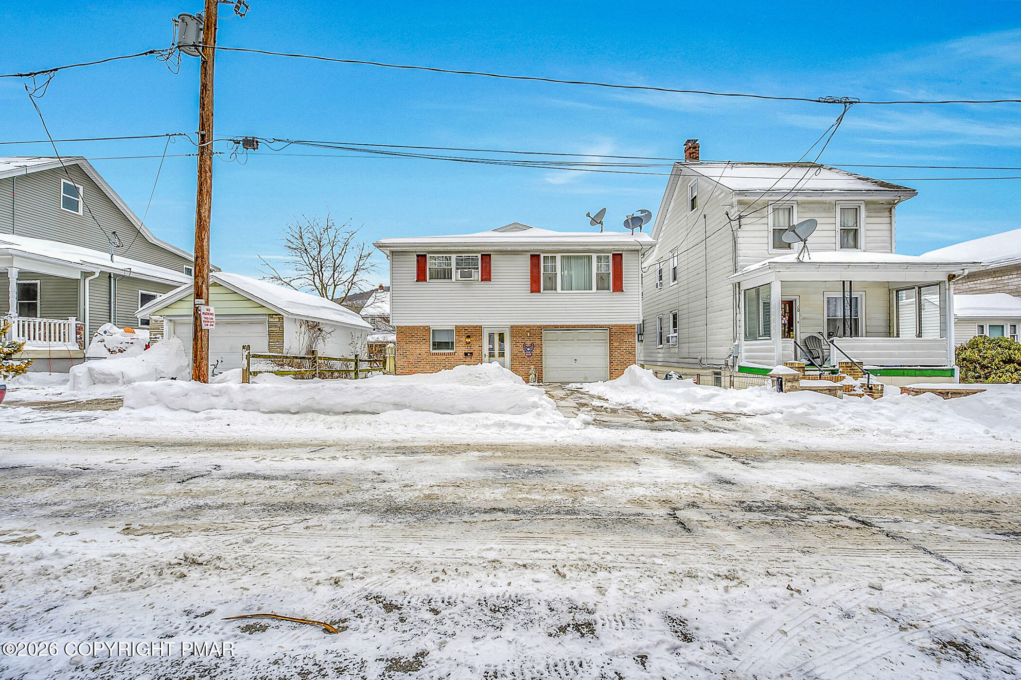 12 Coal Street Nesquehoning, PA 18240 - Photo 32 of 37 a view of a white house with a big yard and large trees