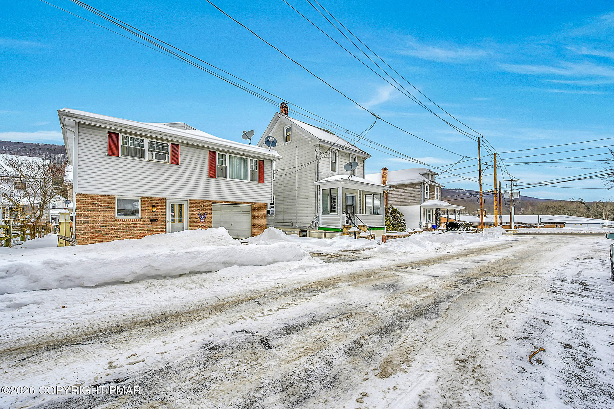12 Coal Street Nesquehoning, PA 18240 - Photo 33 of 37 a big house with a large tree in front of it