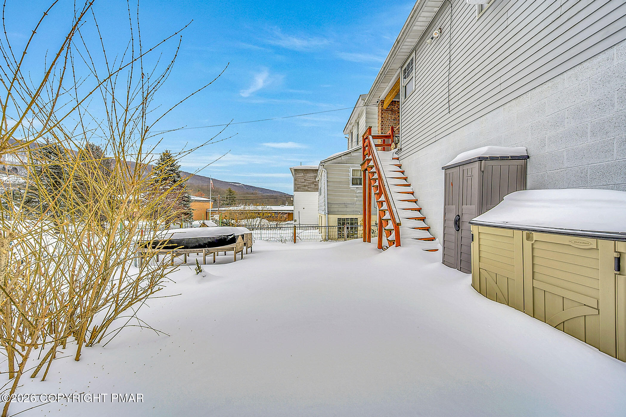 12 Coal Street Nesquehoning, PA 18240 - Photo 37 of 37 a view of a patio with table and chairs and couches with wooden fence