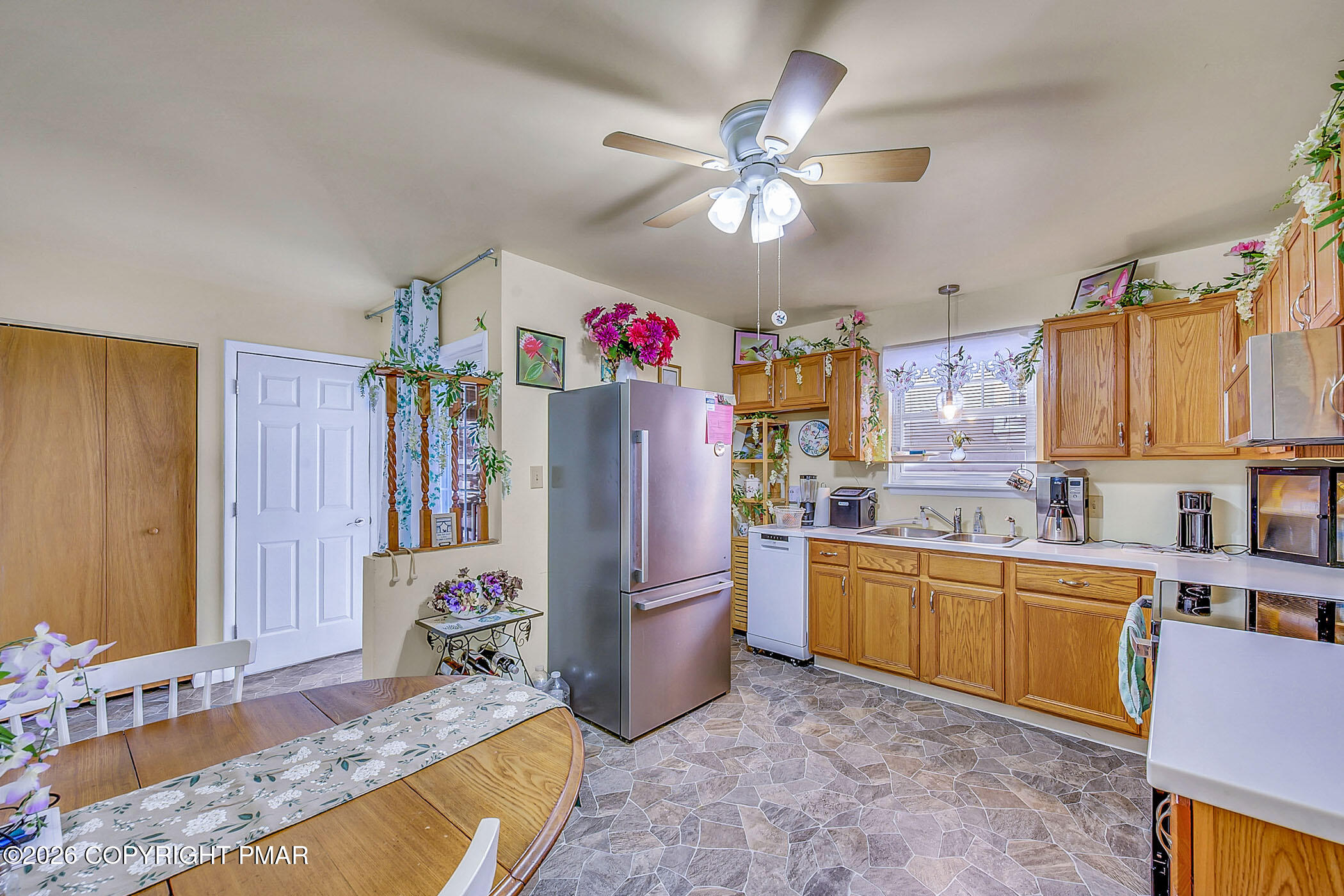 12 Coal Street Nesquehoning, PA 18240 - Photo 4 of 37 a kitchen with granite countertop stainless steel appliances a sink cabinets and a window
