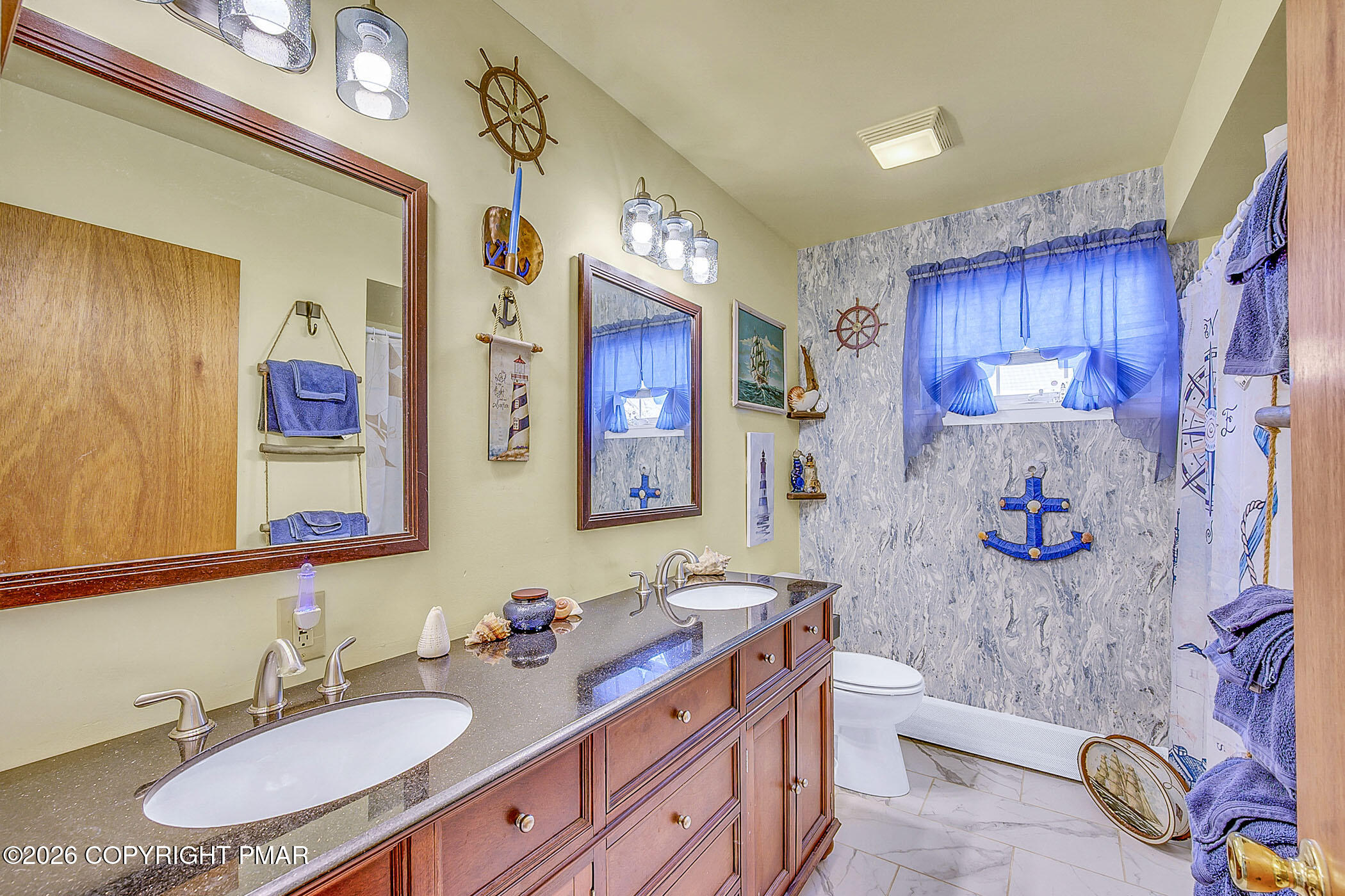 12 Coal Street Nesquehoning, PA 18240 - Photo 8 of 37 a bathroom with a sink double vanity and a mirror