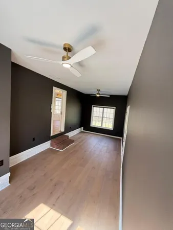 a view of a hallway view with staircase