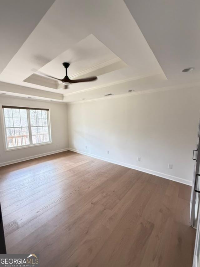 161 Hancock Road Williamson, GA 30292 - Photo 23 of 44 an empty room with windows and ceiling fan