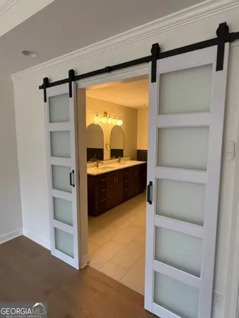 a living room with toilet and sink