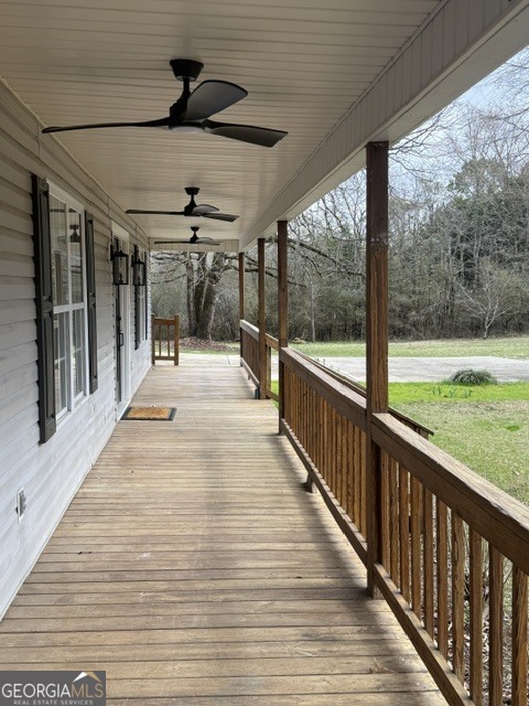161 Hancock Road Williamson, GA 30292 - Photo 3 of 44 a view of a swimming pool with a porch