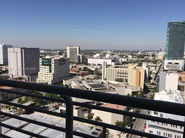 a view of city with tall buildings