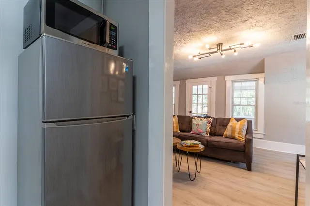 a living room with furniture and a couch