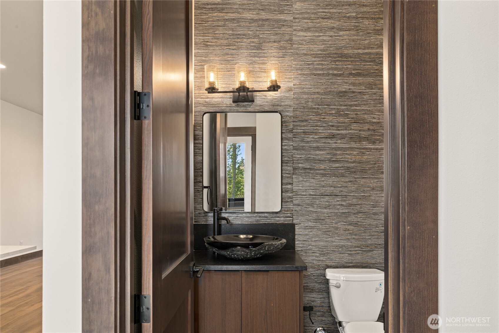 105 Riverbend Loop Cle Elum, WA 98922 - Photo 10 of 22 a bathroom with a sink a toilet and mirror