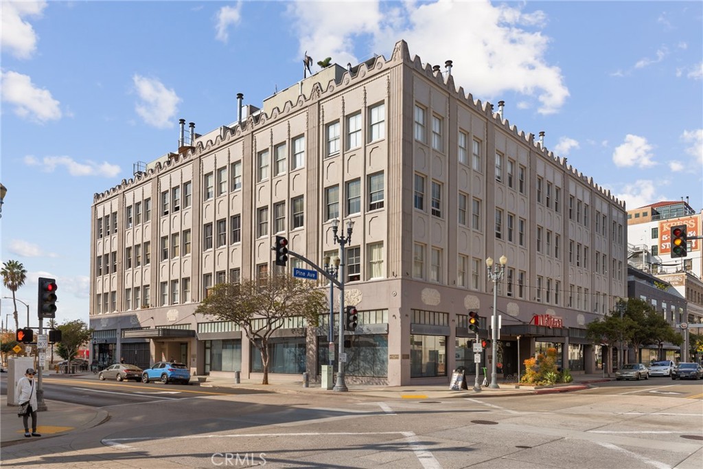 115 West 4th Street, Unit 203 Long Beach, CA 90802 - Photo 13 of 32 front view of a building with a street