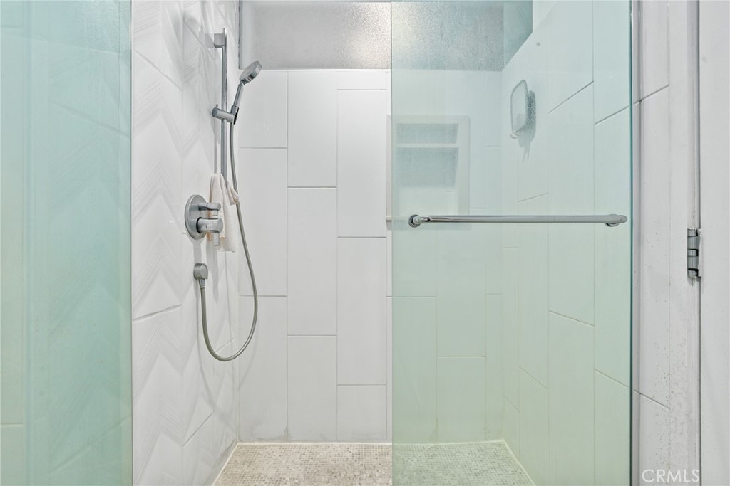 115 West 4th Street, Unit 203 Long Beach, CA 90802 - Photo 20 of 32 a bathroom with a shower