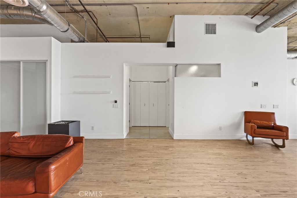 115 West 4th Street, Unit 203 Long Beach, CA 90802 - Photo 31 of 32 a living room with furniture