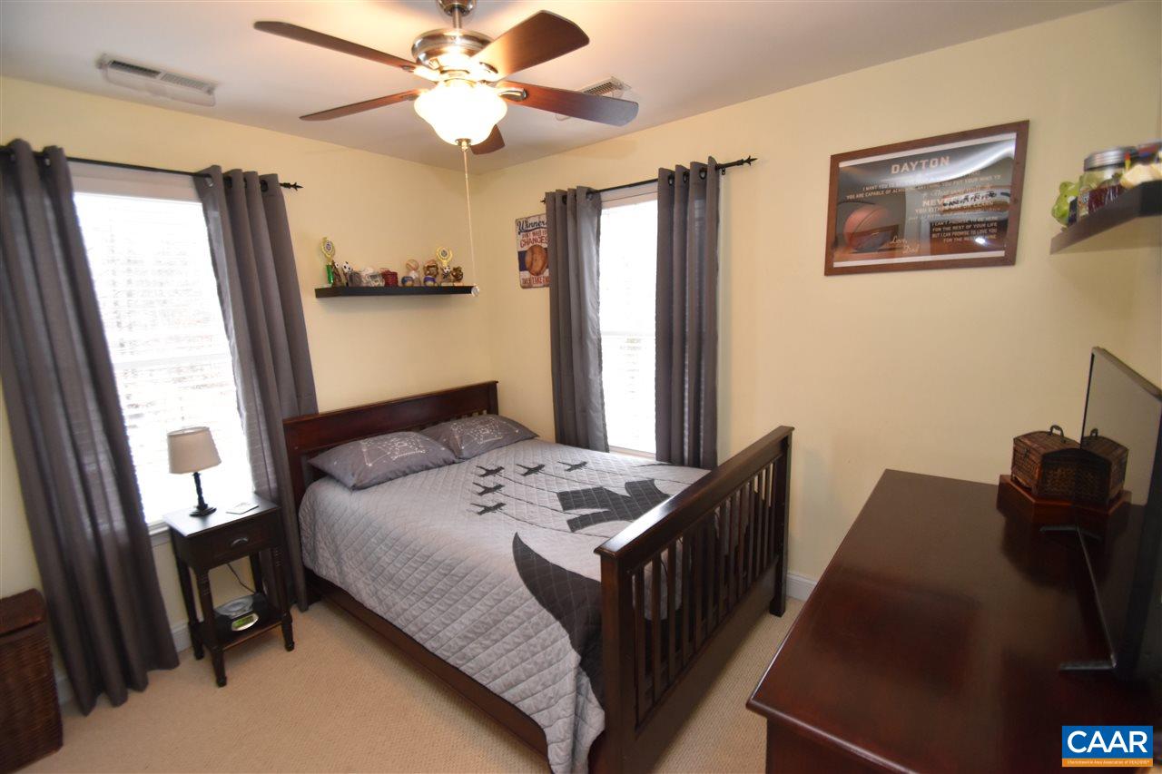 155 Pine Ridge Road Faber, VA 22938 - Photo 13 of 30 a bedroom that has a bed and a dresser in it
