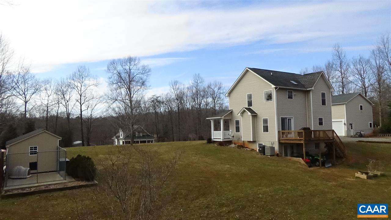 155 Pine Ridge Road Faber, VA 22938 - Photo 2 of 30 a front view of a house with a yard