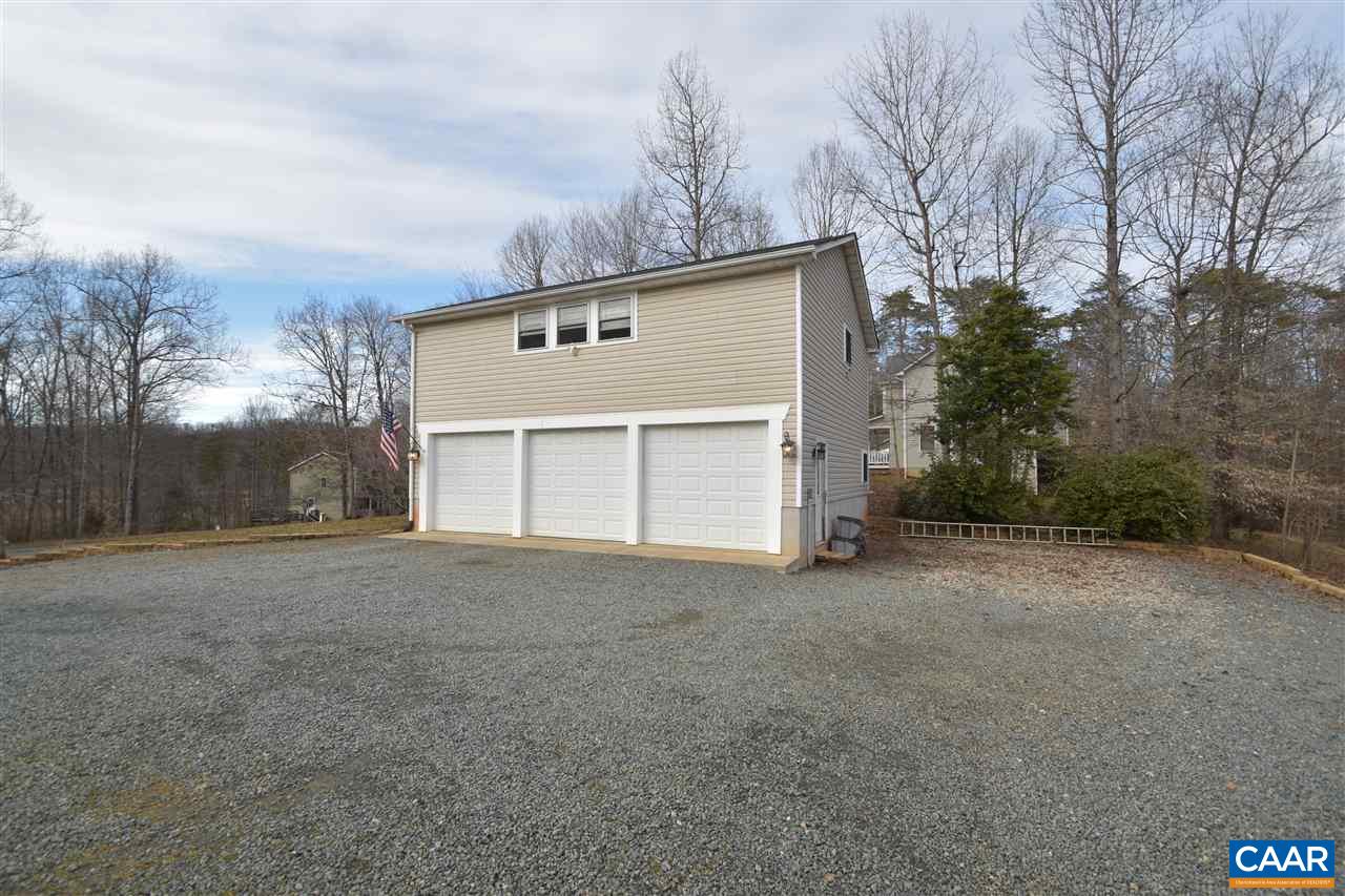 155 Pine Ridge Road Faber, VA 22938 - Photo 27 of 30 a view of a house with a yard and garage