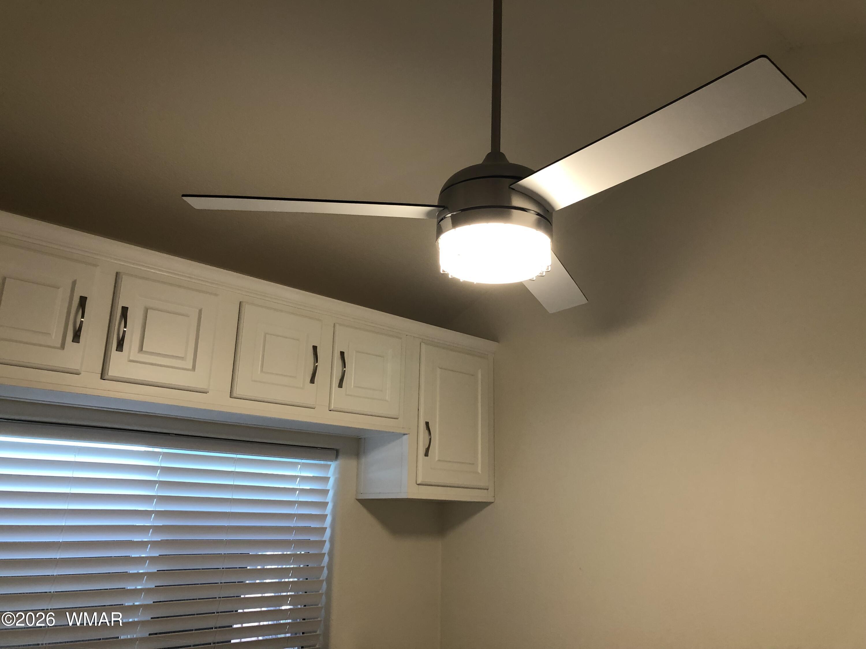 2301 Turtle Creek Road Show Low, AZ 85901 - Photo 25 of 35 a view of a kitchen with a fan