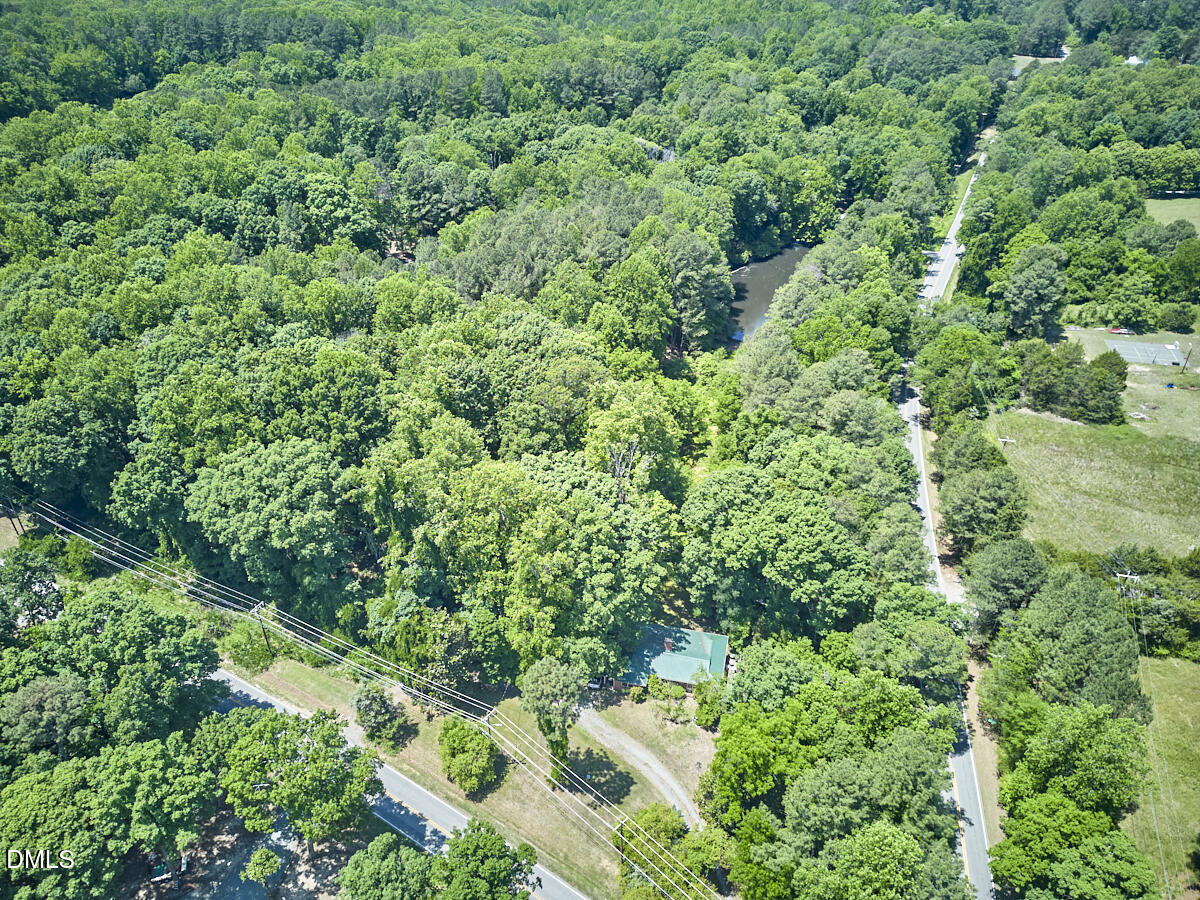 4204 Kerley Road Durham, NC 27705 - Photo 4 of 34 an aerial view of a house with a yard