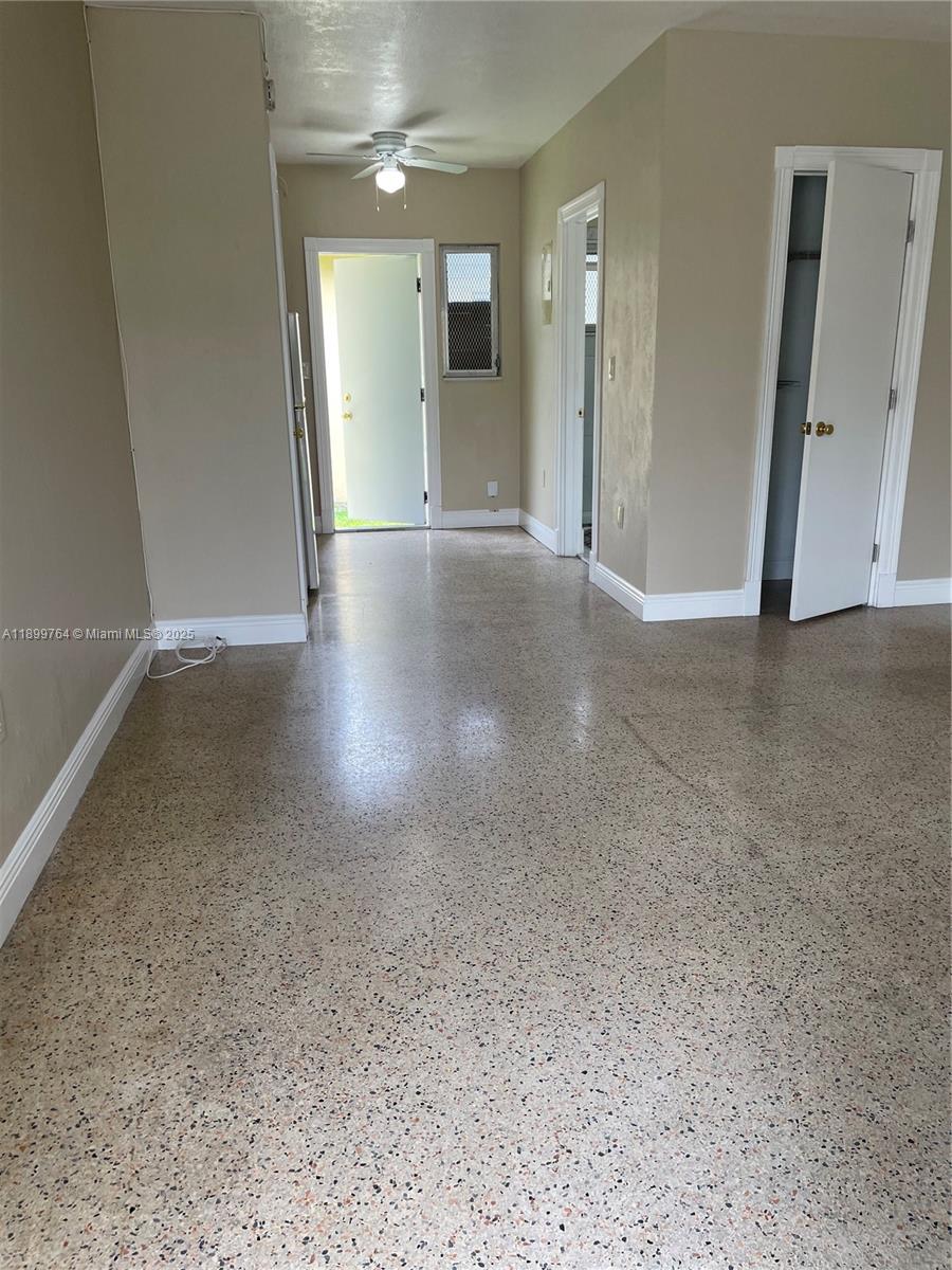 940 Southwest 4th Street, Unit 2 Miami, FL 33130 - Photo 4 of 6 a view of a hallway with wooden floor