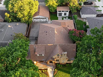 an aerial view of a house with a garden