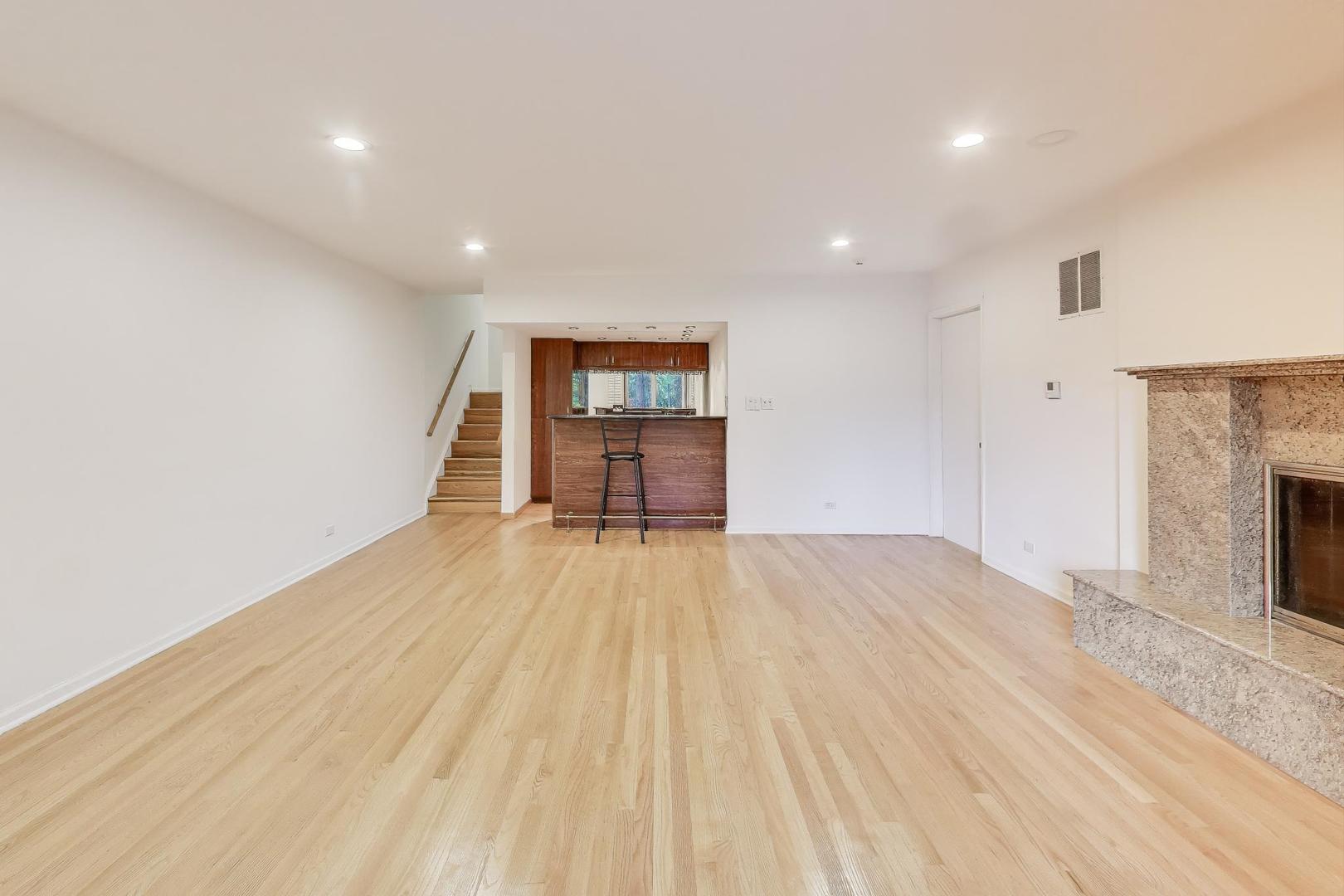 300 Boardwalk Place Park Ridge, IL 60068 - Photo 36 of 52 a view of empty room with wooden floor