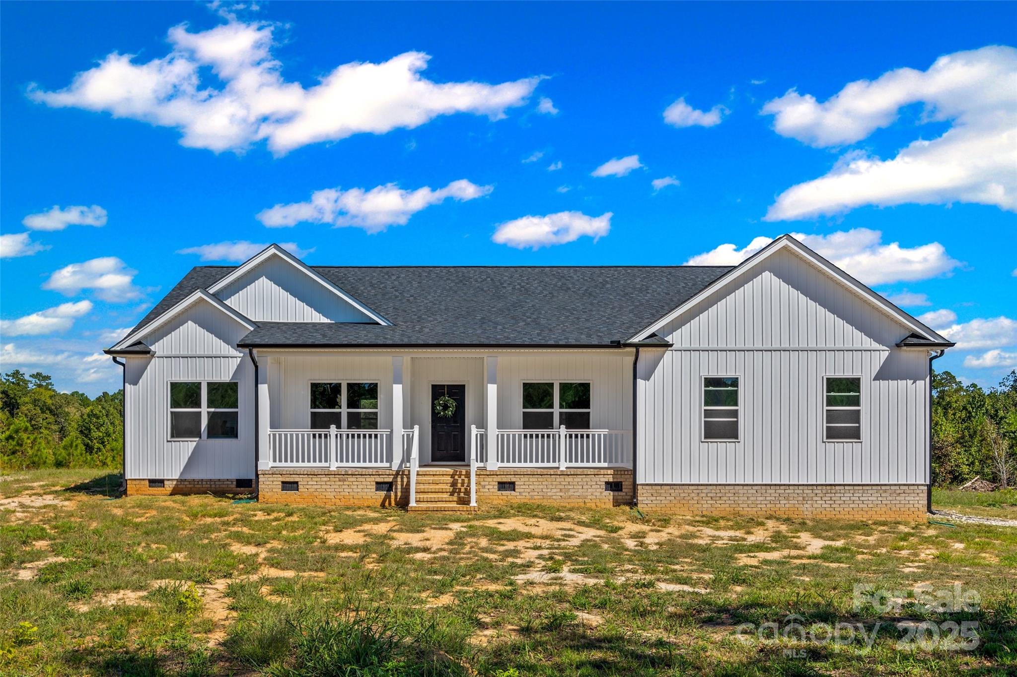 4822 Bull Run Road Blackstock, SC 29014 - Photo 1 of 34 a view of a house with a swimming pool