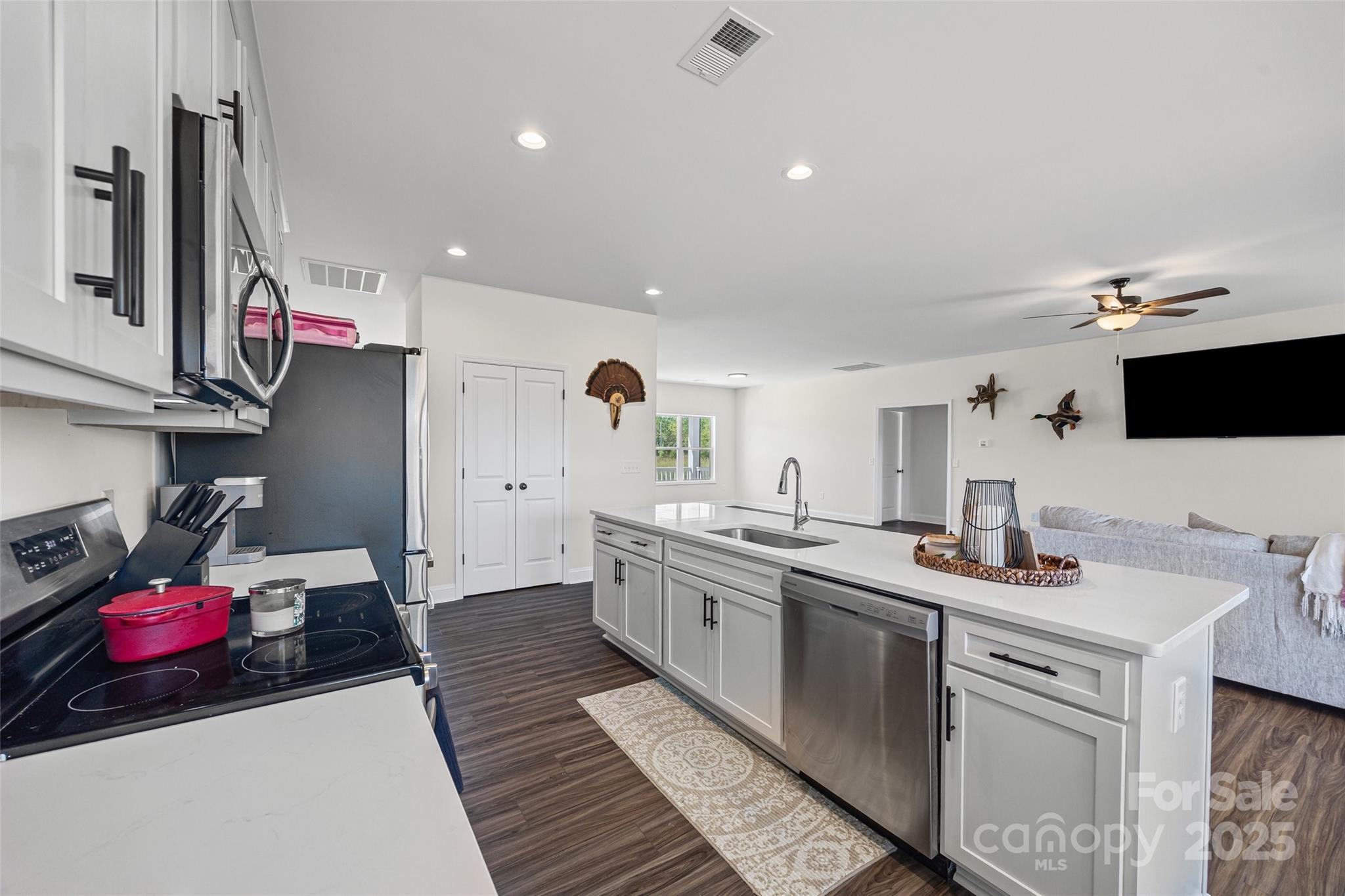 4822 Bull Run Road Blackstock, SC 29014 - Photo 11 of 34 a kitchen with a sink stove and cabinets