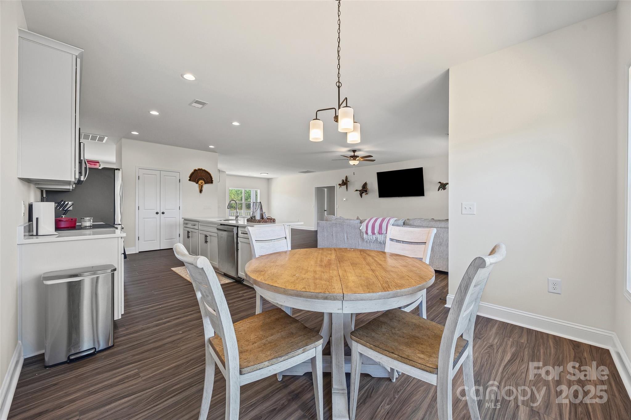4822 Bull Run Road Blackstock, SC 29014 - Photo 13 of 34 a dining room with furniture and wooden floor